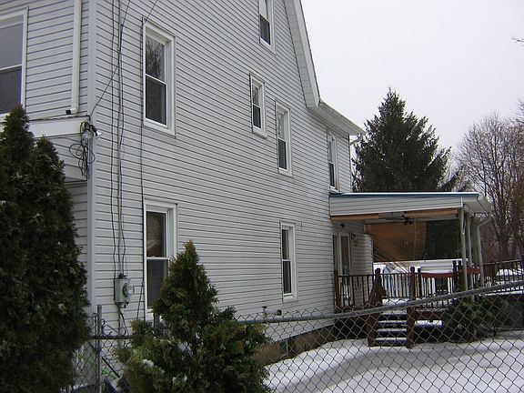 side entrance leads to back yard