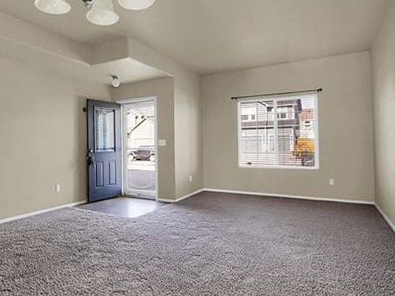 Front entry and formal dining room.