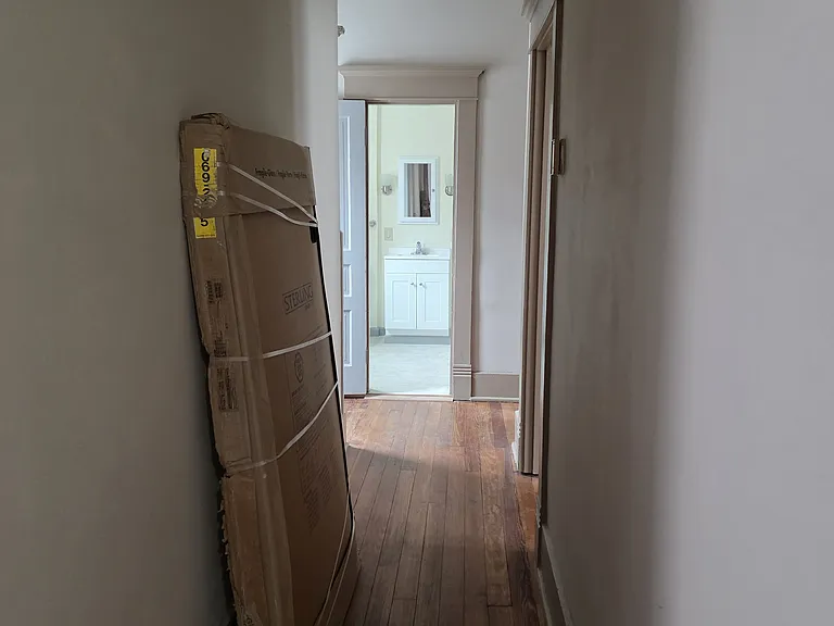 Looking down the hallway toward the 2nd upstairs bathroom.