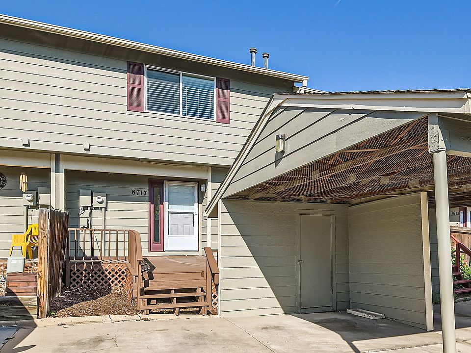 Exterior Entry, one covered parking with small storage area, 2nd uncovered parking space
