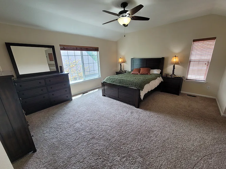 primary bedroom with coffered ceiling