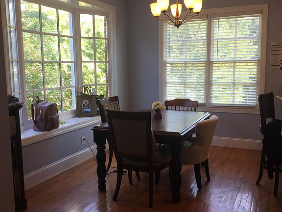 Large dining room with mordern Chandelier for entertaining y