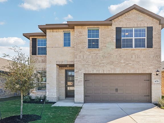 Front exterior of the Sabine floorplan at a Meritage Homes community.