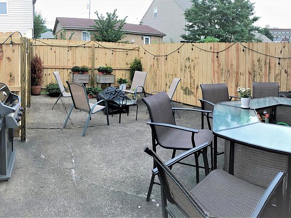 Newly enclosed back patio! Patio furniture can stay with renters by request!