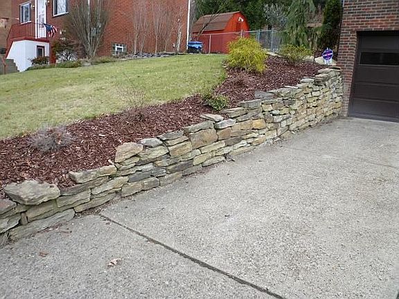 Here is the other stone retaining wall.