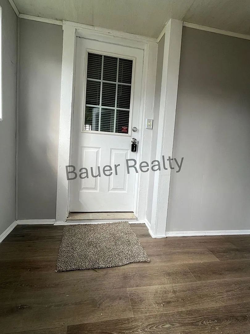 Three Bedrooms, One and a Half Bathrooms — Photo 4