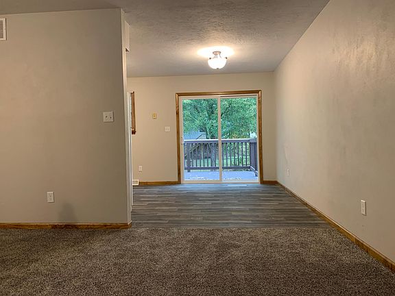 Living room to Dining area/back door to deck