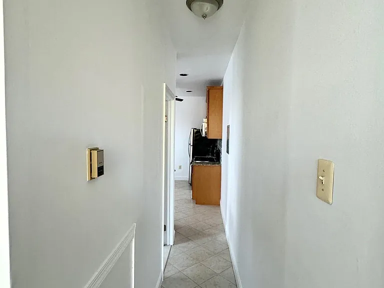 Hallway w/ceramic tile flooring