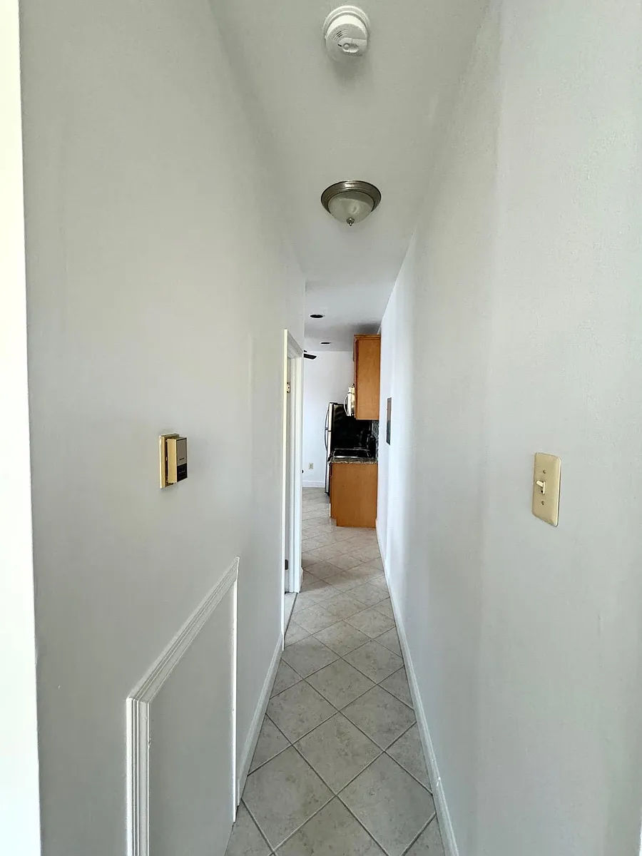 Hallway w/ceramic tile flooring - 123 W Washington Ln #2
