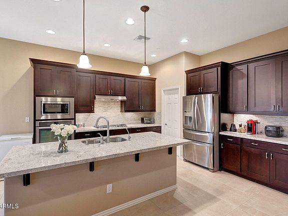 4th image of 10007 E HILLSIDE Drive