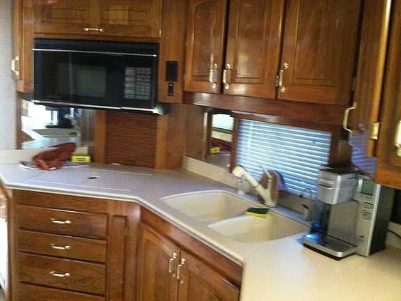 A full kitchen with ALL appliances, including microwave/convection oven, covered cooktop