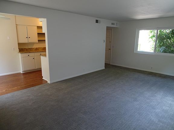 Open living area. New carpets