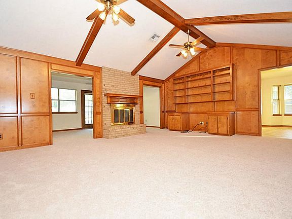 Premium wood built ins with perfect space for the television.
