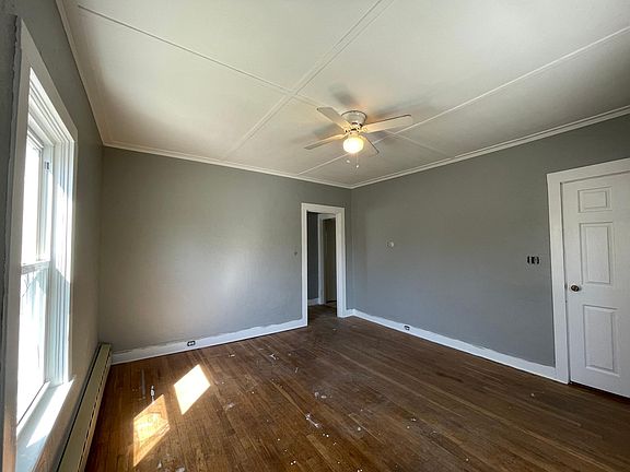Living Room - Currently being renovated. Floors will be refinished and painting will be completed shortly.