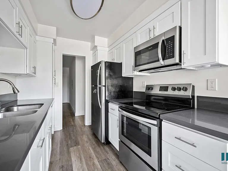Kitchen with Refrigerator, Stove, Microwave Oven, and Dishwasher