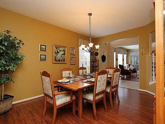 Expand the table, no problem in this spacious formal dining.