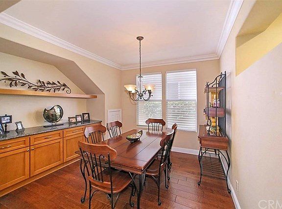 Formal dining room with custom cabinetry