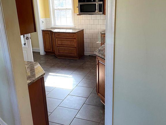 Kitchen from bottom of stairs
