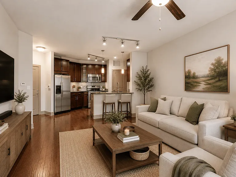 A modern living room with a white couch and a wooden coffee table.