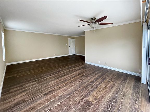 Very private second-floor corner unit, meticulously renovated throughout