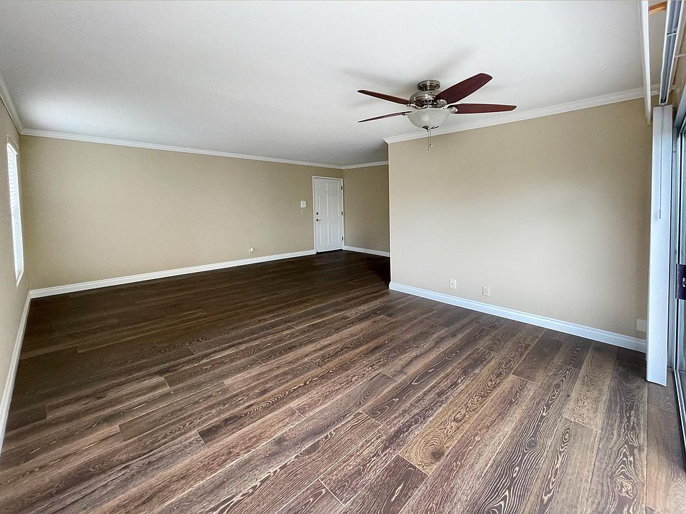 Very private second-floor corner unit, meticulously renovated throughout
