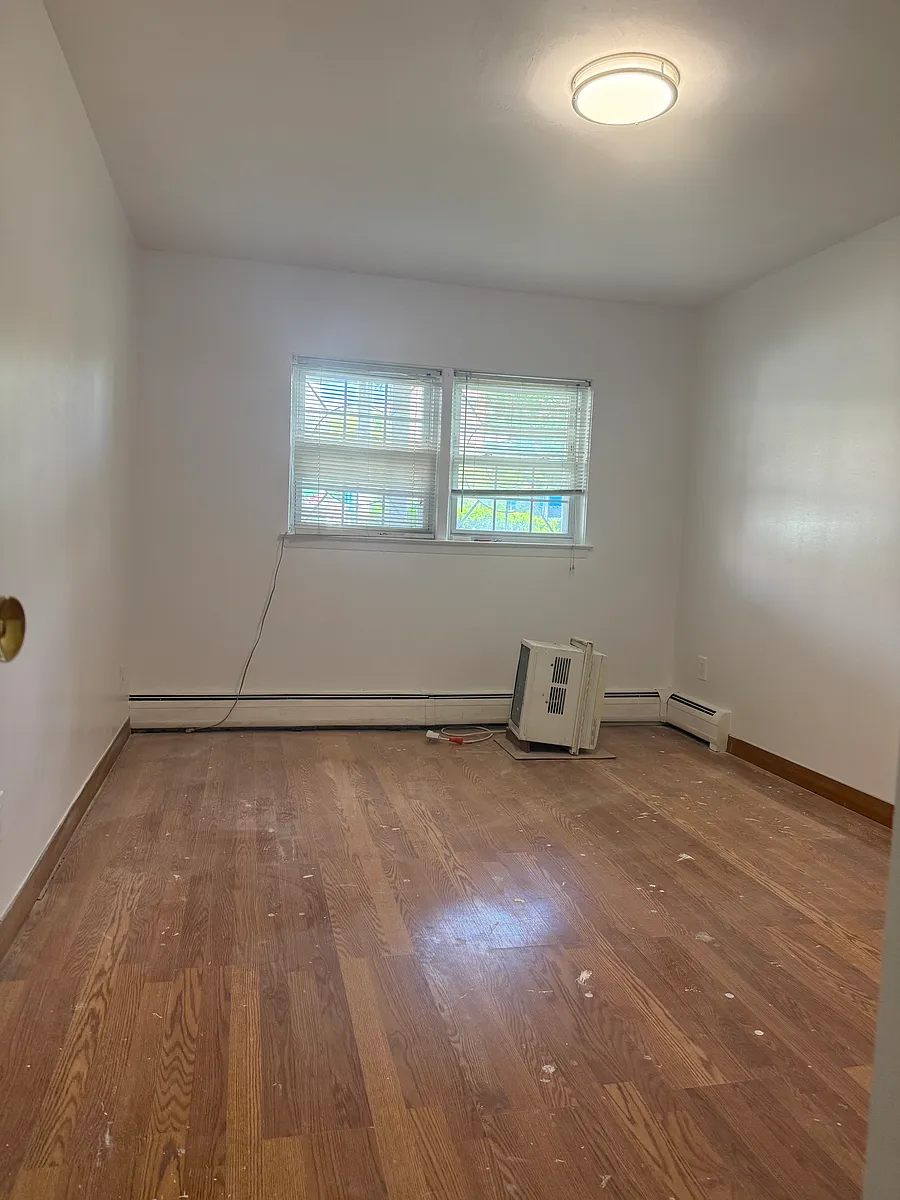 Building Photo - 212-60 16th Ave #1