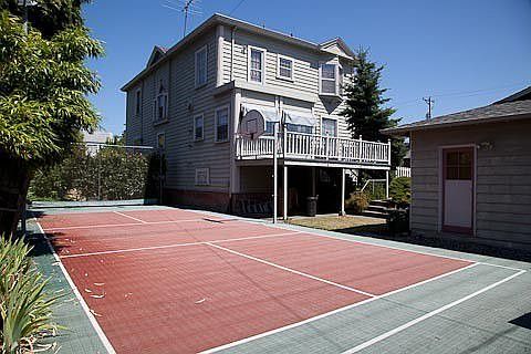 Sports court. Notice the kitchen deck and door to shop.