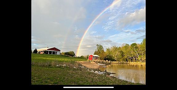 View of pond and barndo