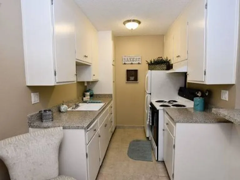 Welcome Home to Garfield Manor — Photo 2