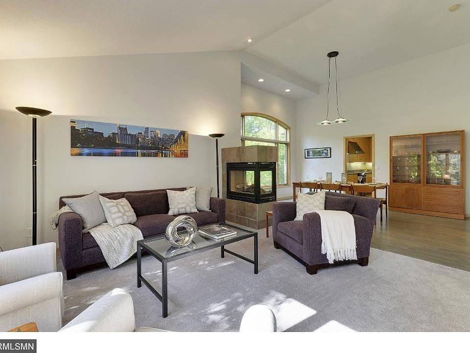 Spacious & open floor plan allows the living room open up to the dining room. Tons of natural light & vaulted ceilings.
