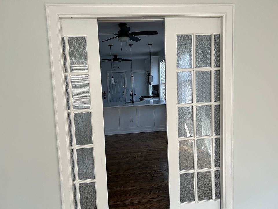 Pocket doors toward dining room and kitchen