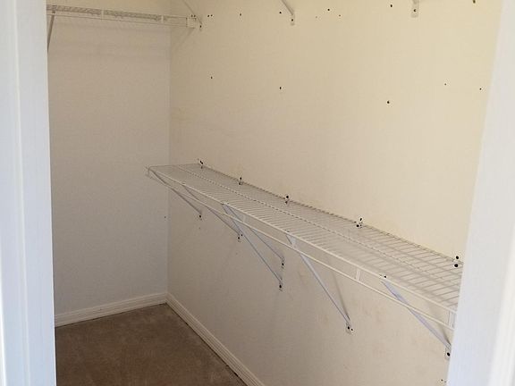 Walkin closet in the master bathroom