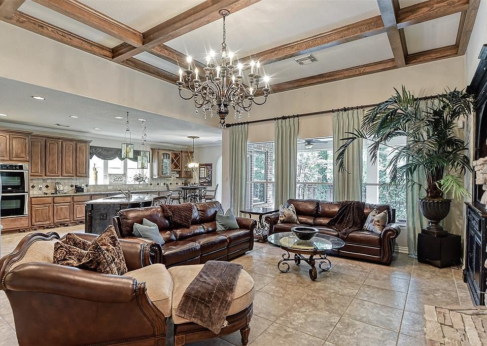 Cozy family room open to the kitchen. Perfect for entertaining.