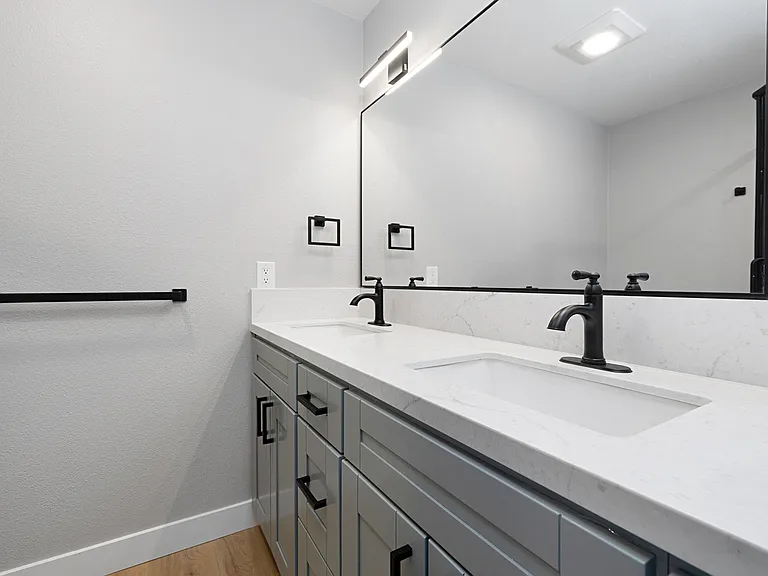 Primary bedroom ensuite bath with double vanity