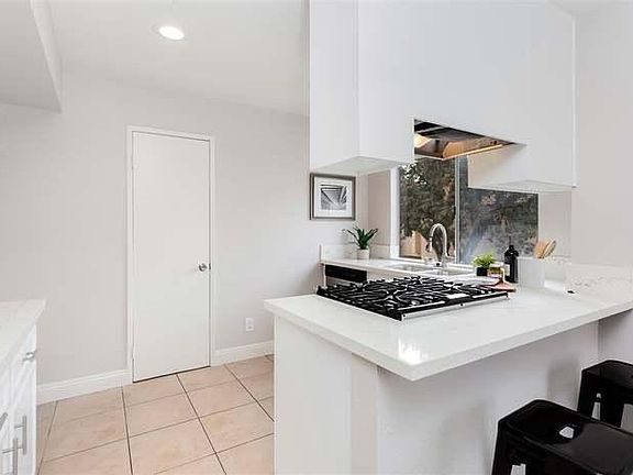 Kitchen with gas grill stove