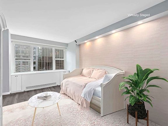 5th image of 115 E 9th St APT 6A