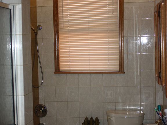Bathroom with shower and jetted tub
