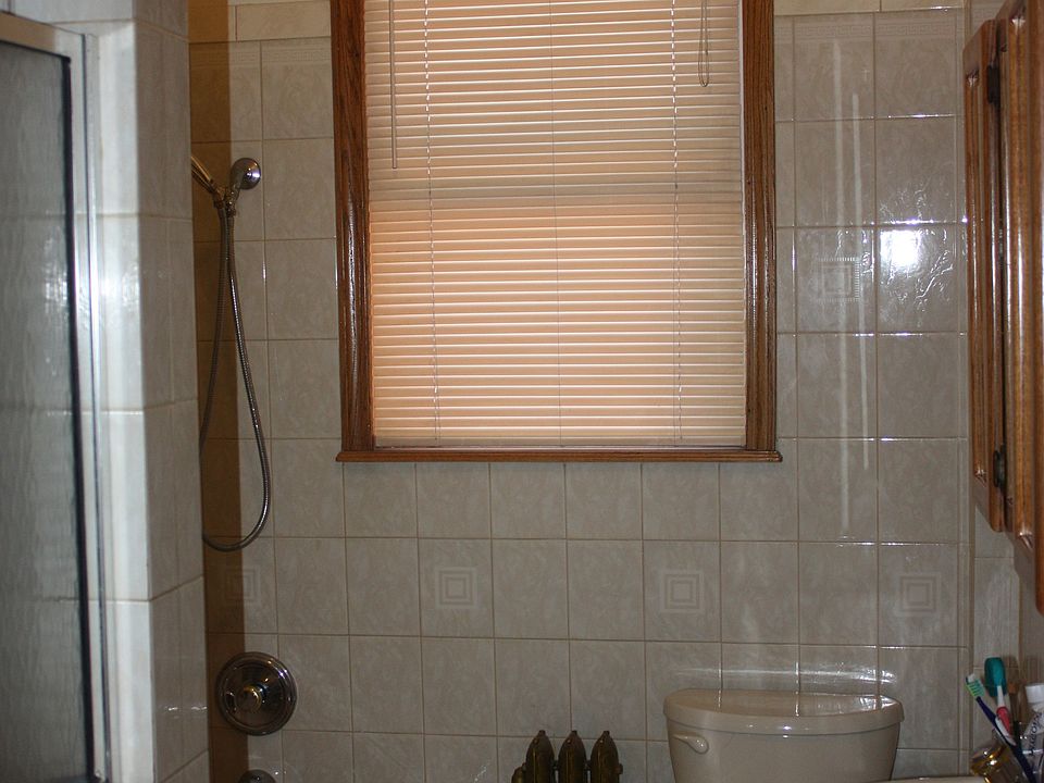 Bathroom with shower and jetted tub