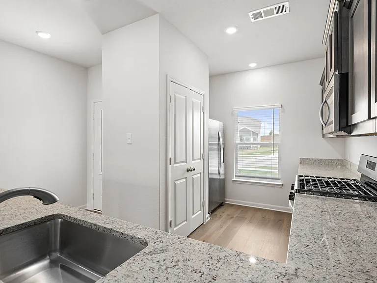 The kitchen has a pantry.