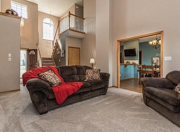 Another view of the family room which leads into the kitchen.   Carpet installed 09/2016.
