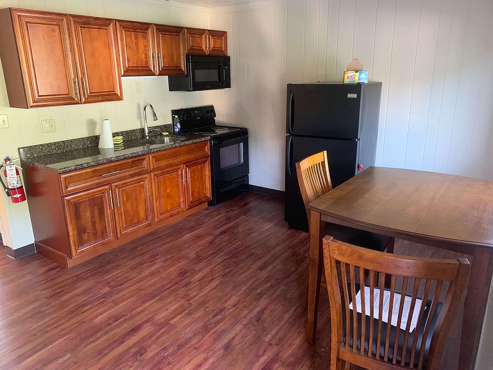 Kitchen, granite countertop, also has kitchen table and chairs