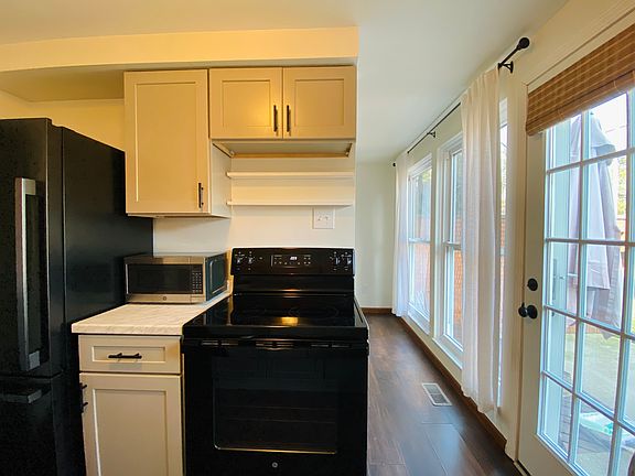 Microwave and other appliances included.