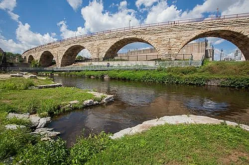 Stone arch walking bridge