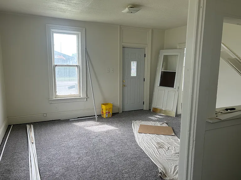 Living room features new paint, new front door, carpet and lights (not pictured)