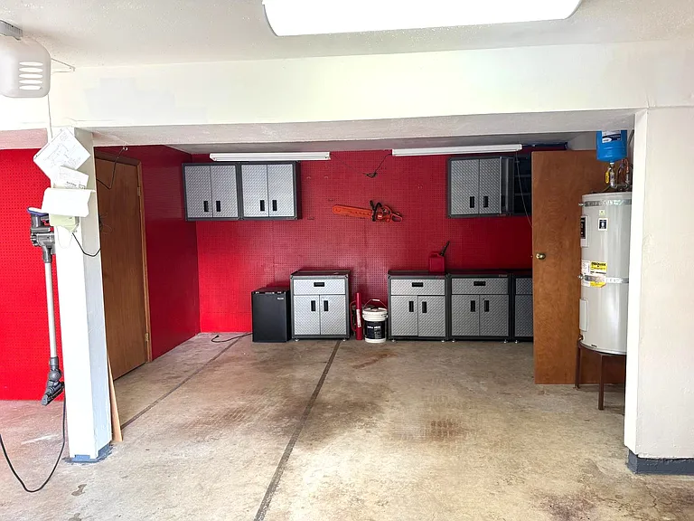 2 car garage with built in storage / tool cabinets