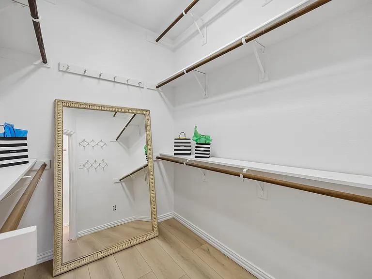 XL Primary bedroom walk-in closet