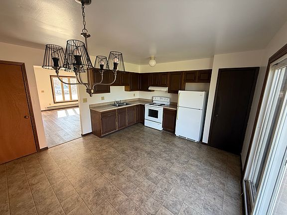Refrigerator and range are furnished.