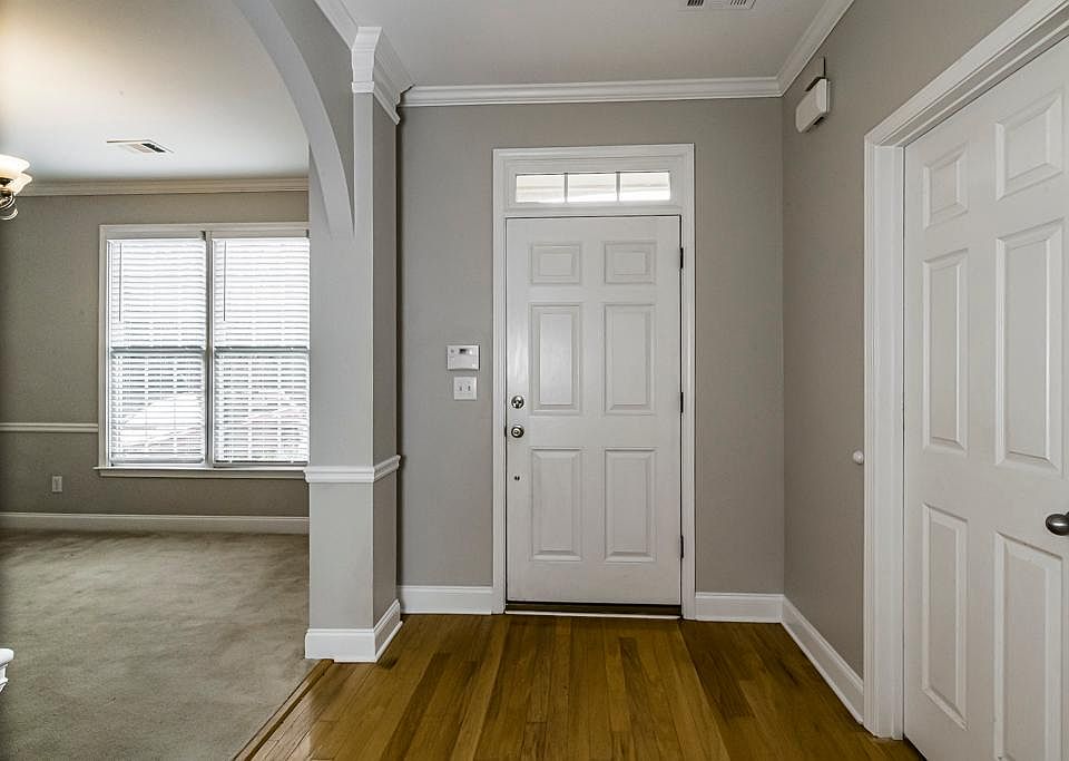 Wide foyer and transom windows for more natural light