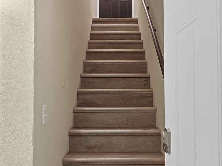 This is where you'll enter the home. Walk straight up the stairs to your unit. Keypad on the exterior door as well as your unit that will be have a custom code for your stay.