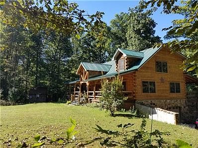 Quality built construction with room to grow into in the lower level. The home includes two garden sheds and a workshop/detached garage.